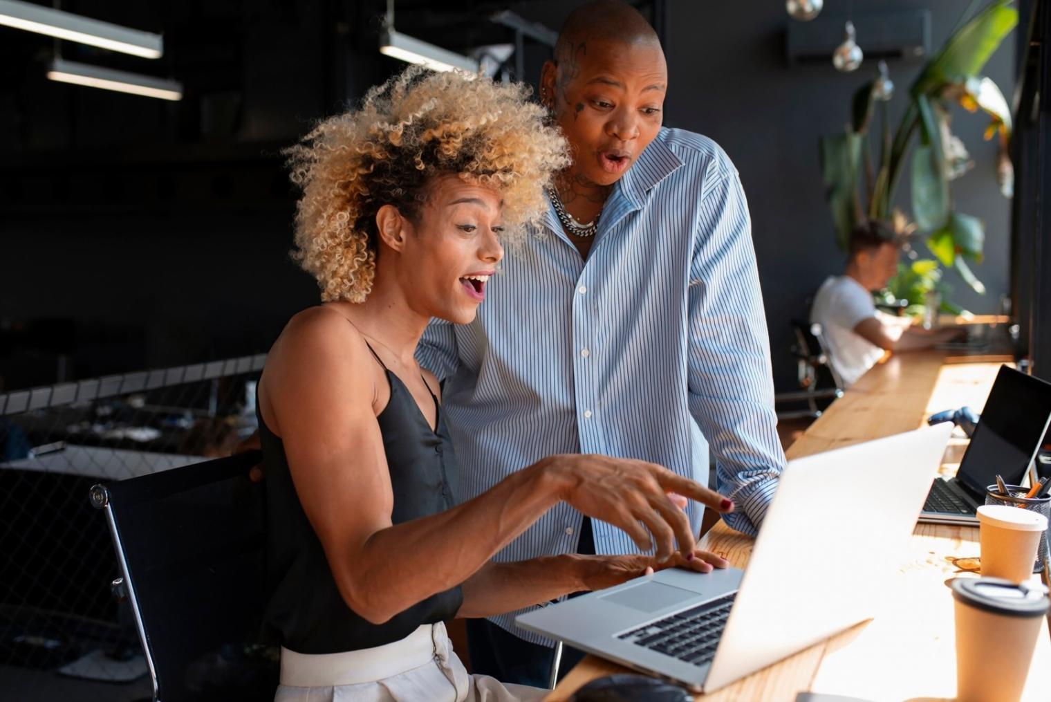 Professional team collaborating on network management training in modern office environment