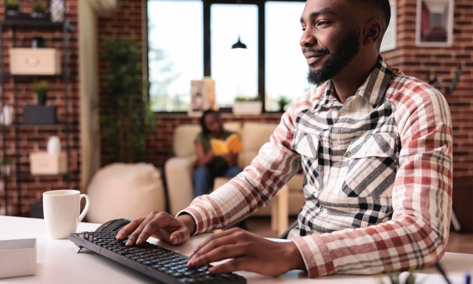 Modern computer setup showing network monitoring dashboard